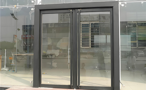 崆峒玻璃地弹门